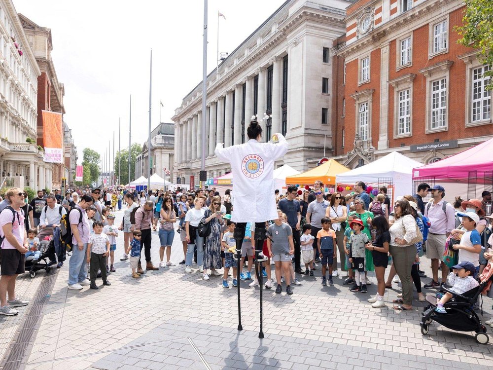 Man on stilts in Exhibition Road