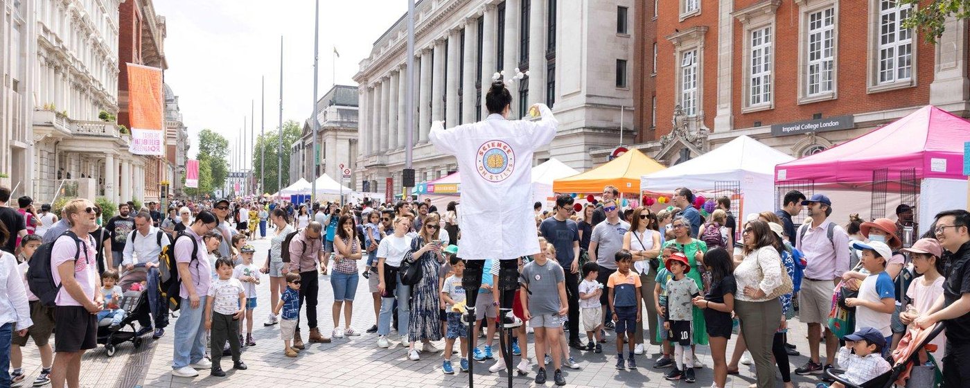 Man on stilts in Exhibition Road